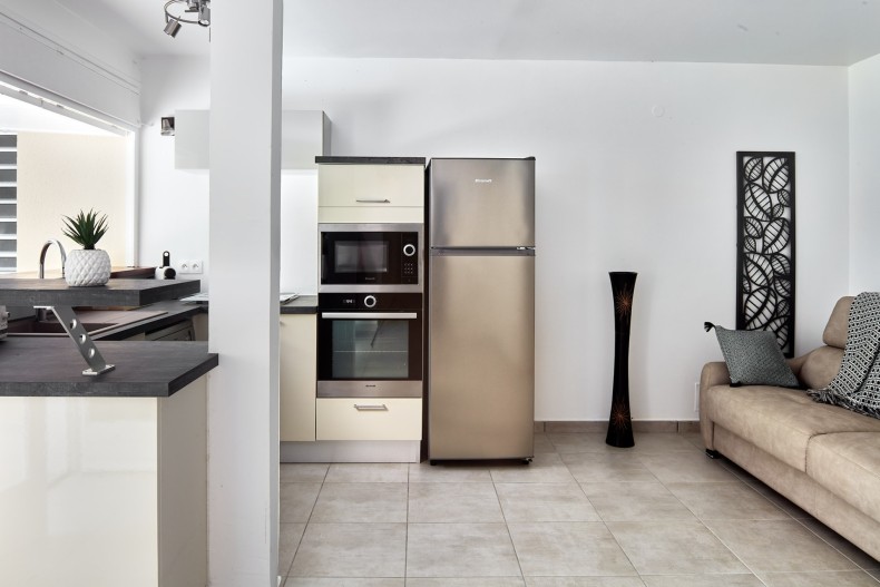 Salon climatisé de l'appartement en rez de jardin